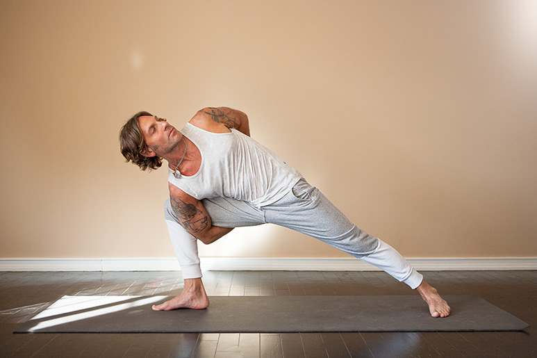 Eric Paskel in a Yoga Pose Los Angeles Yoga Instructors