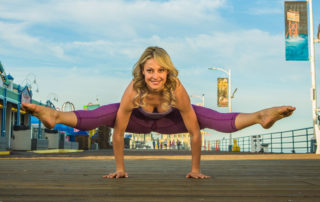 Elise is wearing Run Jump Jump 'N Twist Crop in Viola and Twistie Tank in Seattle Mist. For more information visit yogasmoga.com