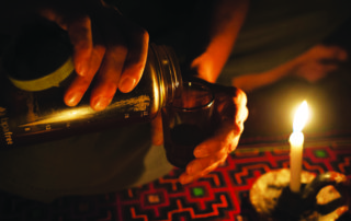 Chris Kilham pouring ayahuasca