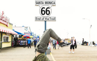 Brock Cahill at the Santa Monica Route 66 sign