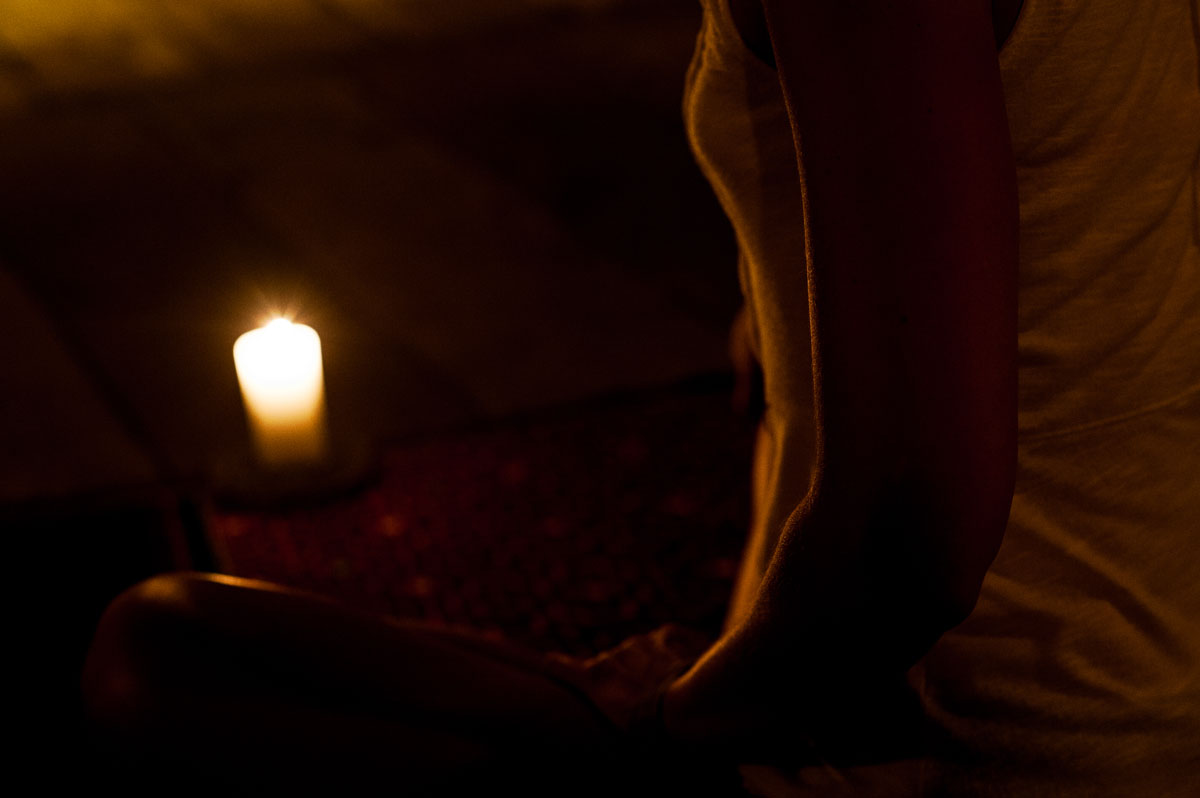 Candlelight in the maloka (ayahuasca ceremonial space). Photo by Tracey Eller.