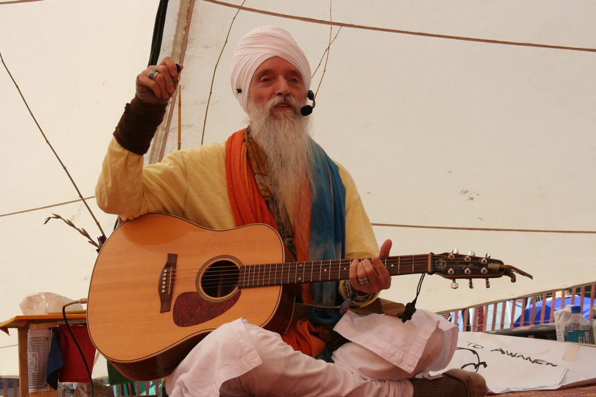 Guru Singh teaching Yoga at Lightning in a Bottle 