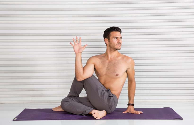 Paul Teodo in a yoga pose. LA YOGA 