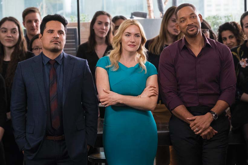 (Foreground L-r) MICHAEL PEÑA as Simon, KATE WINSLET as Claire and WILL SMITH as Howard in New Line Cinemas’, Village Roadshow Pictures' and Warner Bros. Pictures' ensemble drama “COLLATERAL BEAUTY,” a Warner Bros Pictures release. Photo by Barry Wetcher