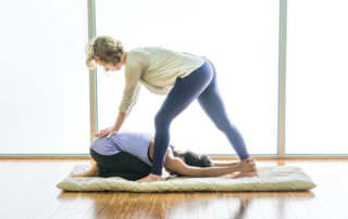 Yoga Therapy Certification Practitioner and Client demonstrating