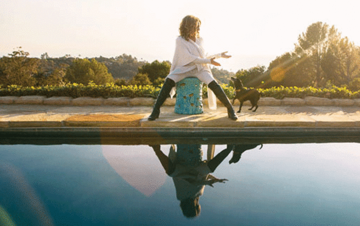 Deidre throwing orbs for dog for six keys to happiness