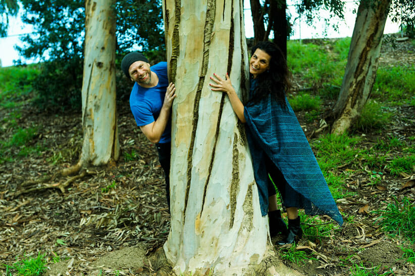 Joe K and Parashakti hugging trees