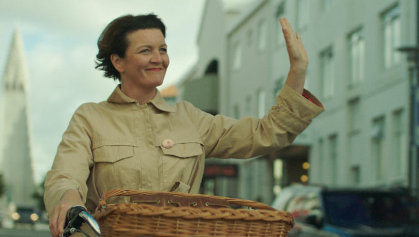 Halladora on a bicycle in Woman at War 