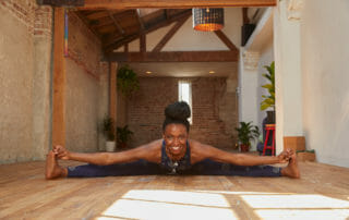 Chioma Nwosu in yoga pose for cannabis yoga