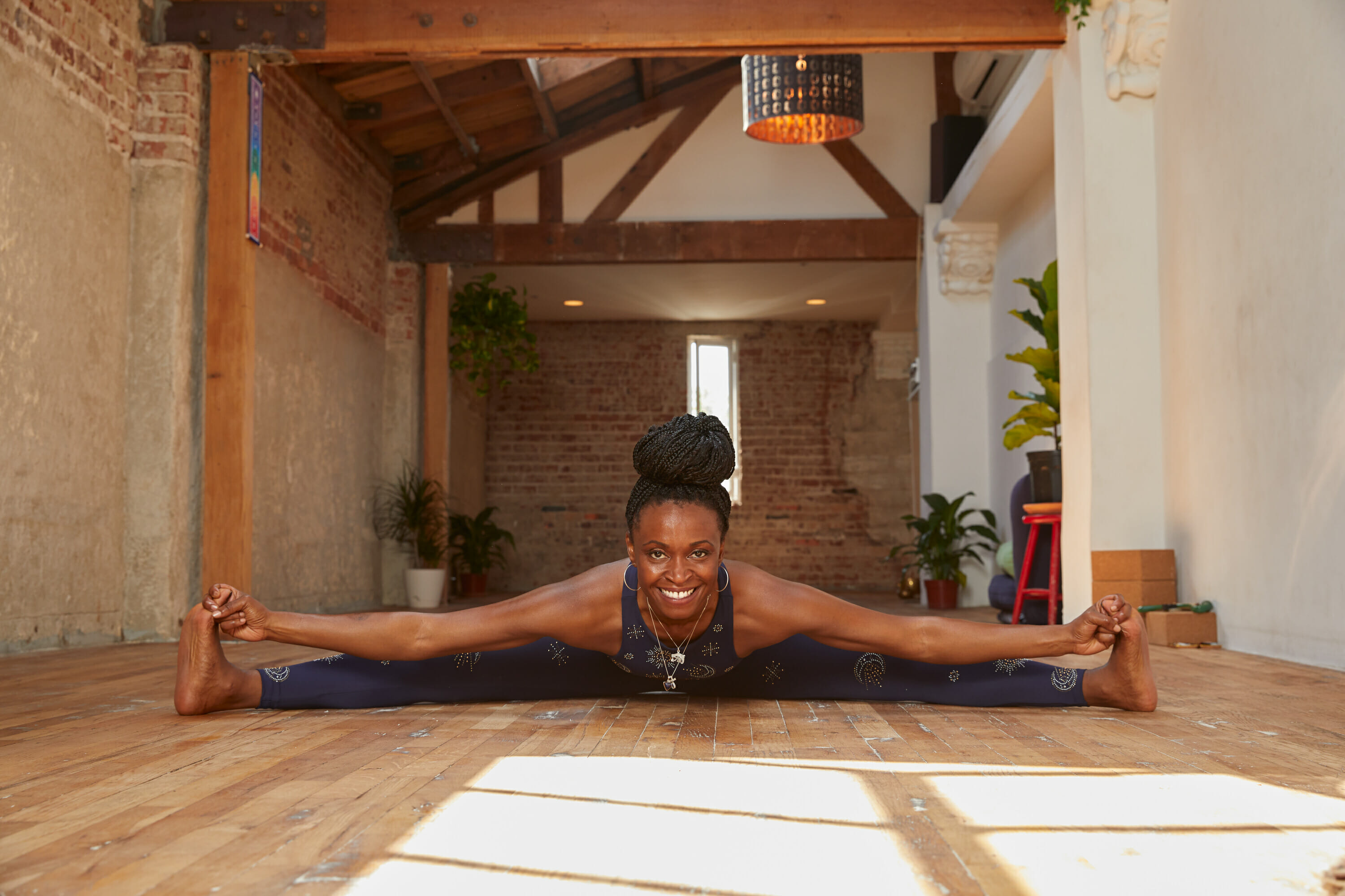 Chioma Nwosu in yoga pose for cannabis yoga 