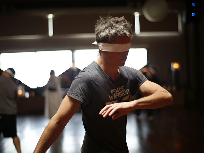 Man with Blindfold practicing techniques for Addiction Recovery