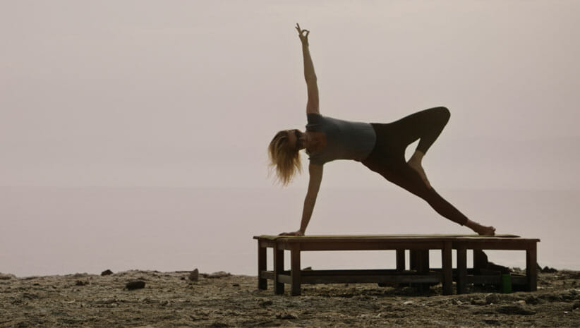 person doing yoga in the film The Portal 