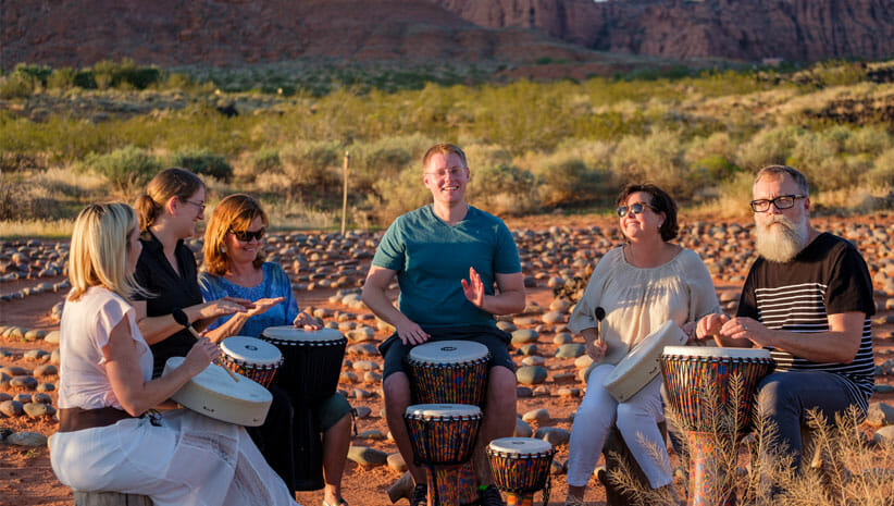 People participating in a drum circle 