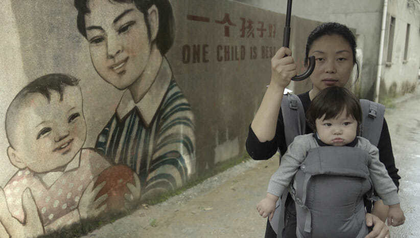 One Child Nation film still woman with baby