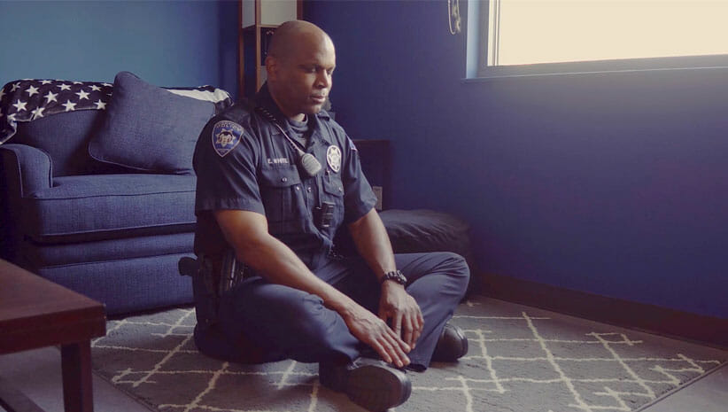 police officer meditating from The Mindfulness Movement