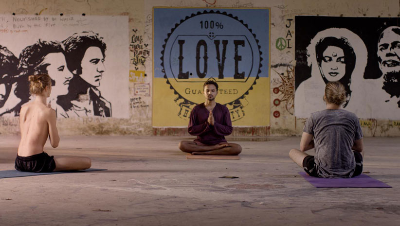 Scene of people meditating in the film Chasing the Present 