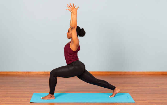 Woman in Yoga Pose showcasing energy is current identity