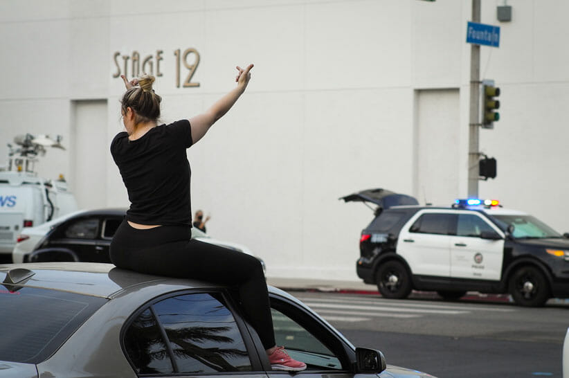 Woman flips off Stage 12 on Gower Street in Hollywood.