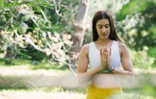 Yoga Teacher hands in Namaste