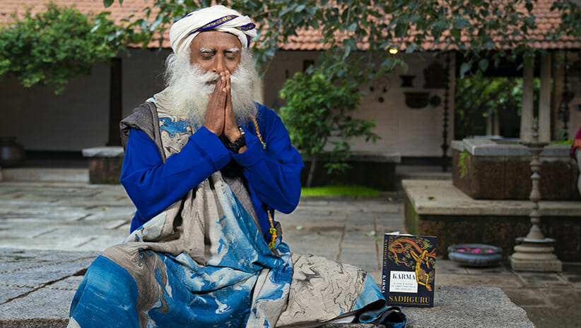 Sadhguru with Karma book 