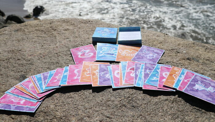 Deck of cards on the ocean focused on how to heal trauma 
