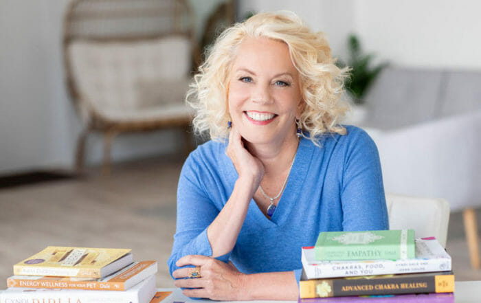 Cyndi Dale with books describing golden kundalini energy