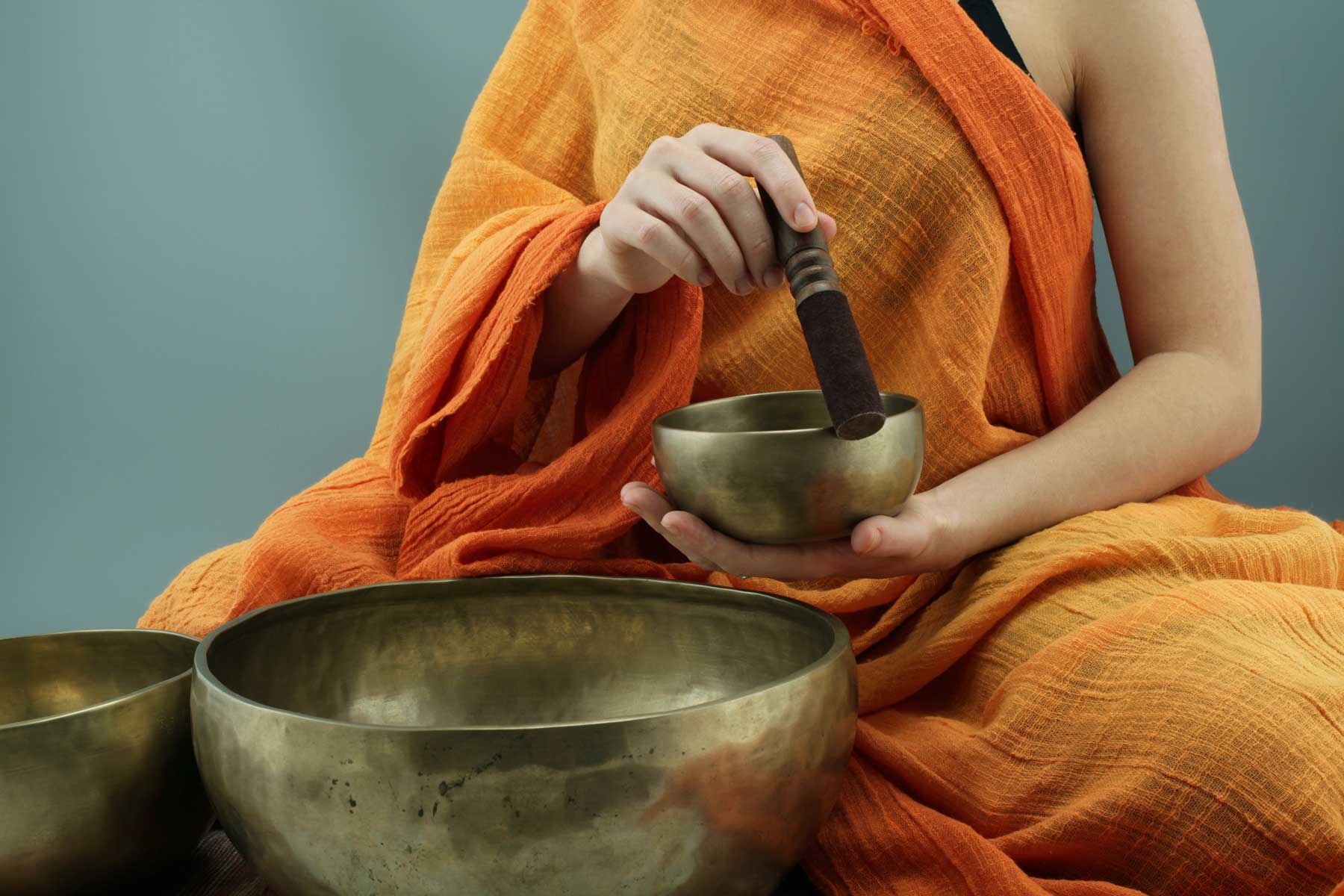 person holding meditation bowl to show easiest meditation techniques
