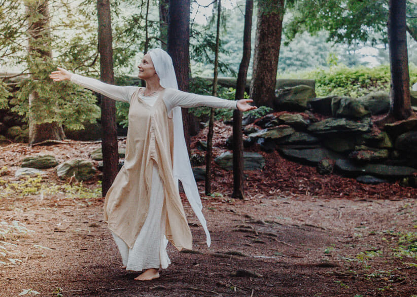 Sntam Kaur shares healing music wearing white in a forest 