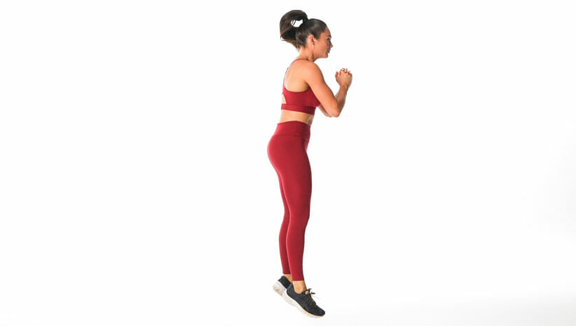 Burpee Demonstration by woman with red yoga clothing