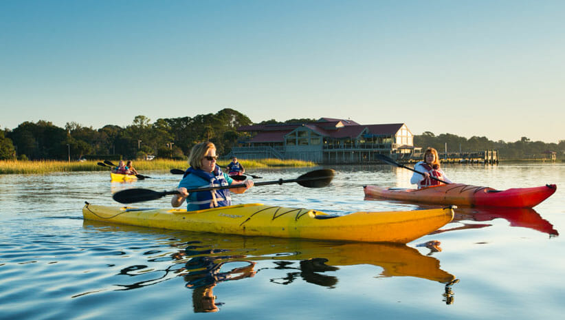 kayakers engaged in proactive health care activities at Hilton Head Health