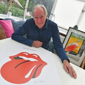 Artist John Pasche with his Rolling Stones logo inspired by Kali