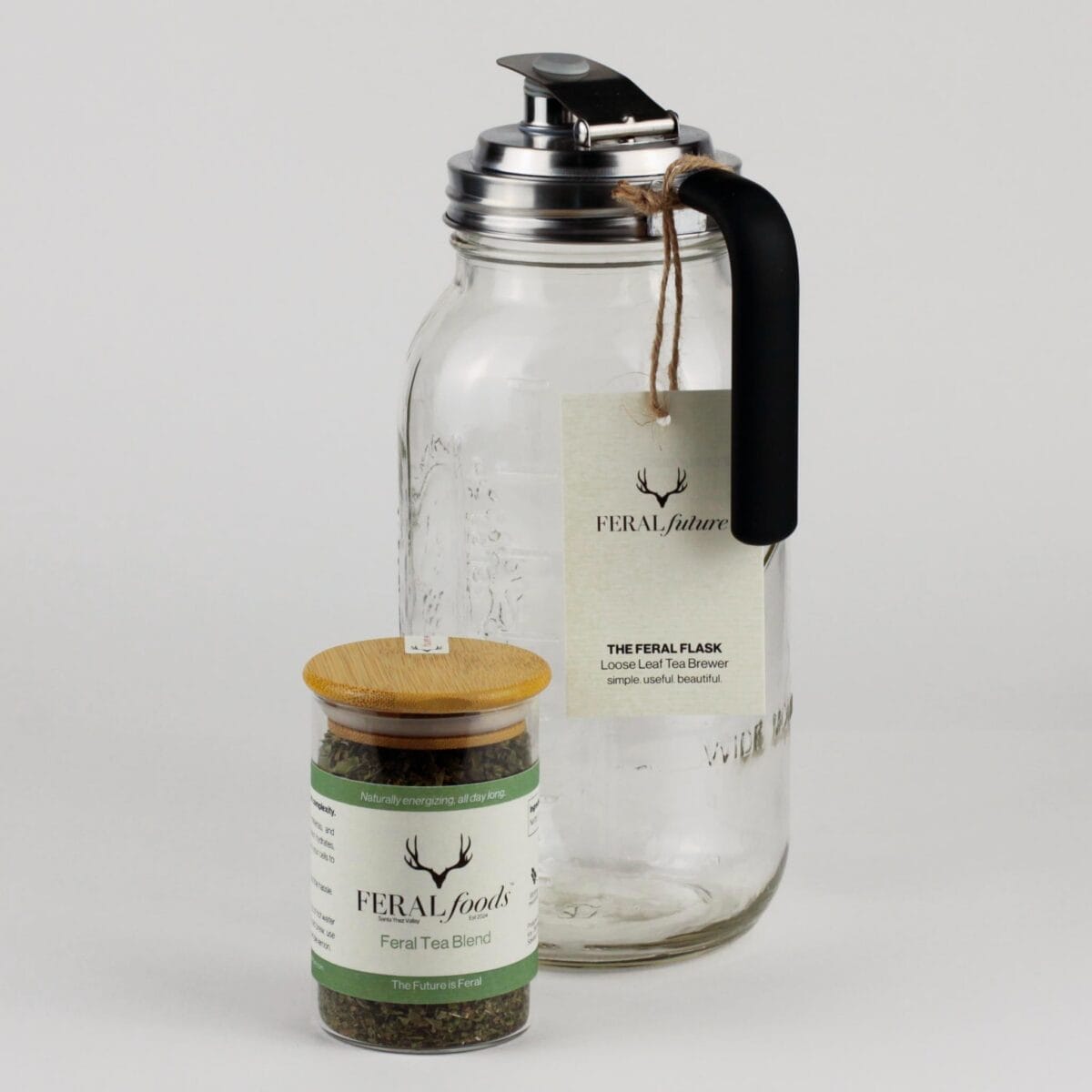 kit with glass tea flask and jar of tea